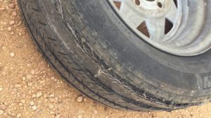 Navigating the Bumpy Road-Shredded Tire